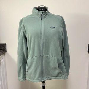 The North Face size XXL green jacket with 2 front pockets. Very lightweight